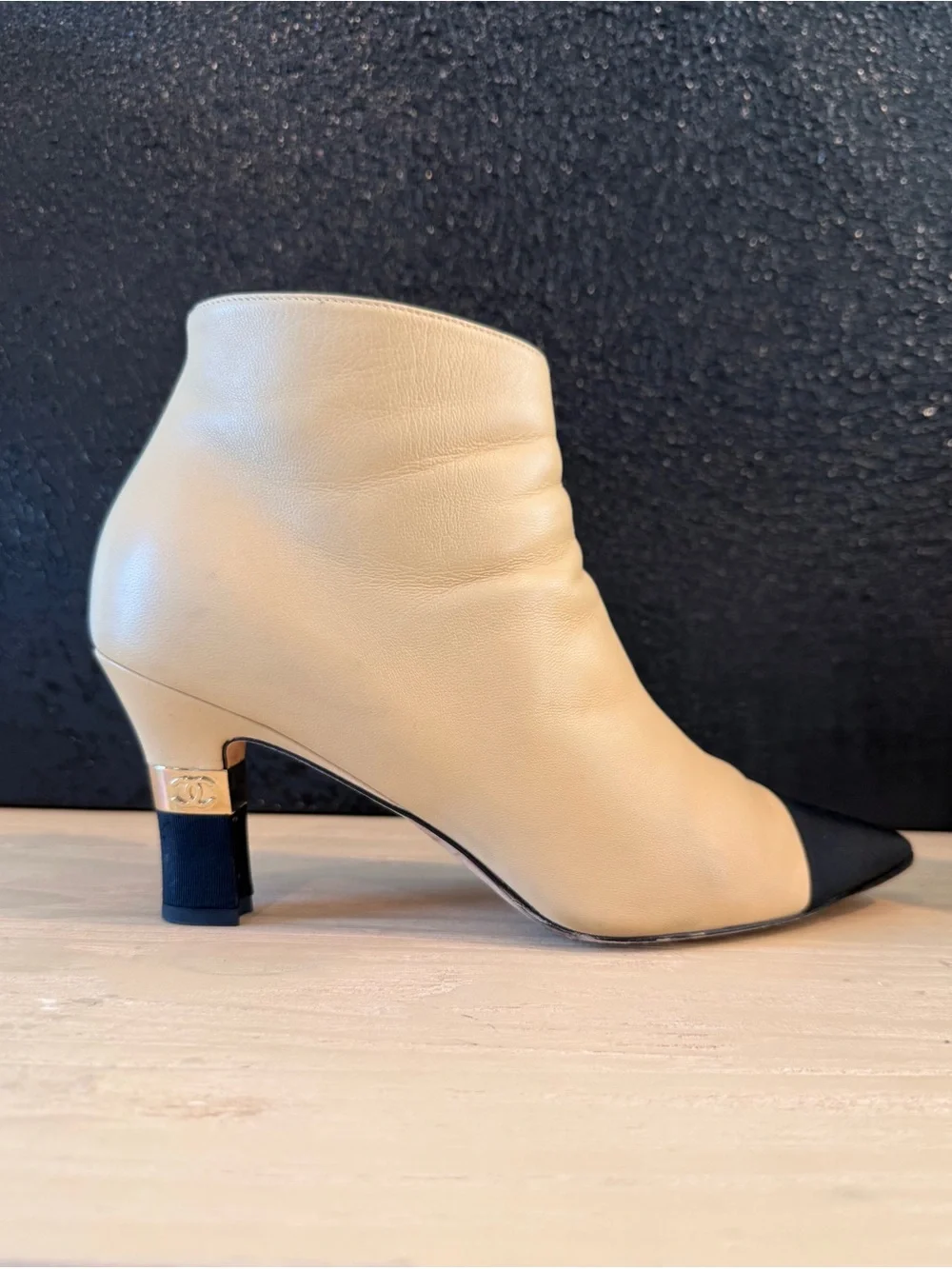 CHANEL Beige Leather Ankle Boots with Black Cap Toe